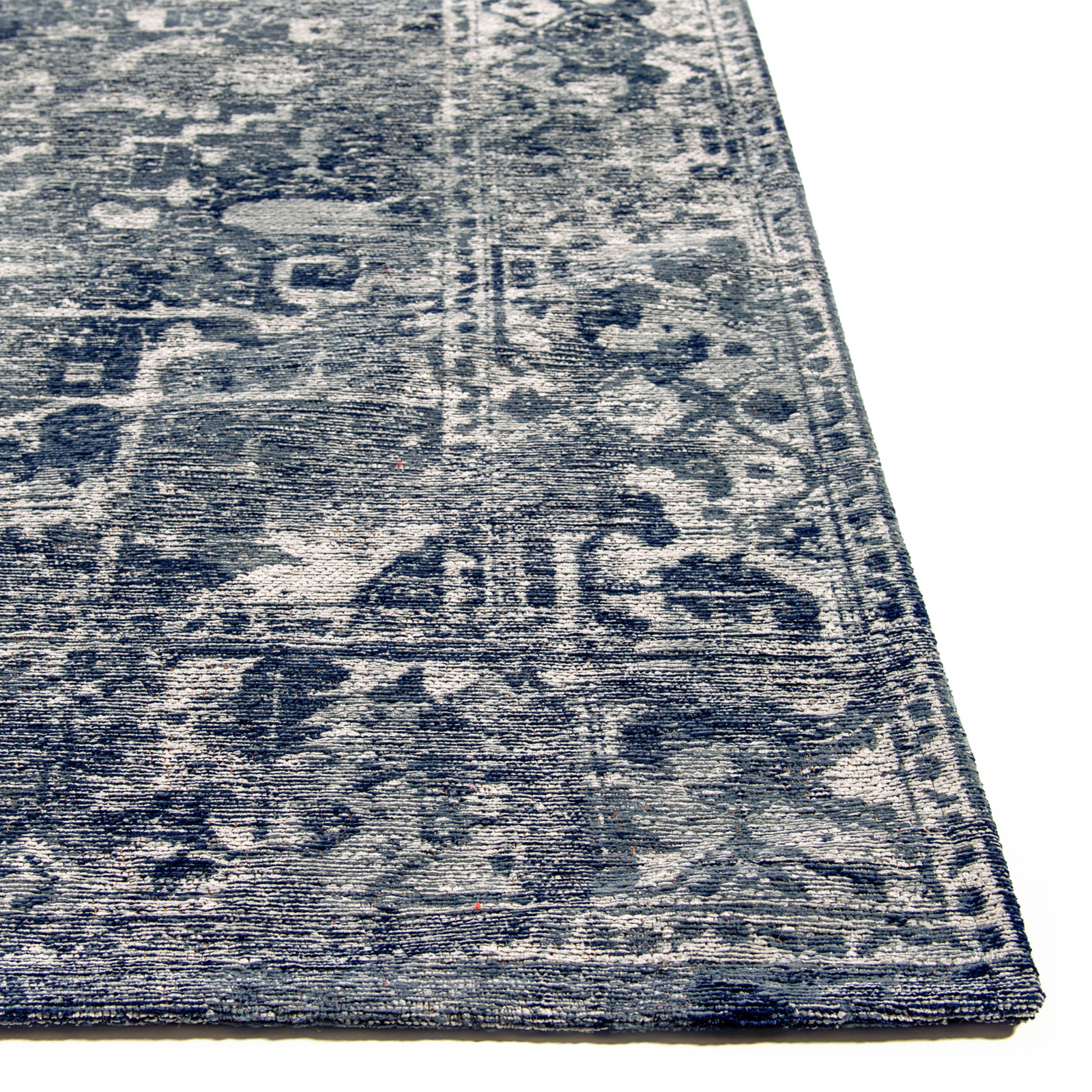 Vloerkleed Heris blauw met sierlijke motieven in het midden, vervaagde kleuren en texturen, antieke look