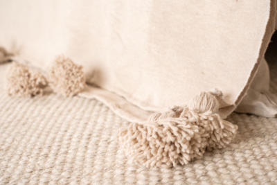 MÔMÉ plaid Pom Pom creme