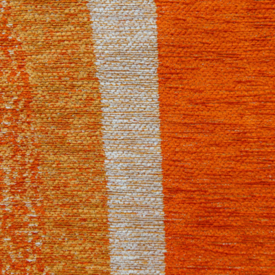Rechthoekig oranje Poum Poum tapijt met abstract patroon en geometrische vormen