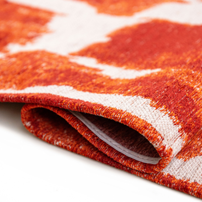 Abstract design vloerkleed Ikat met vlekken en vage vormen oranje en ivoor