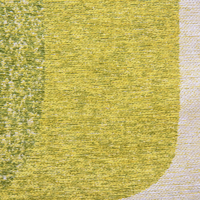 Rechthoekig groen tapijt met abstract patroon en geometrische vormen